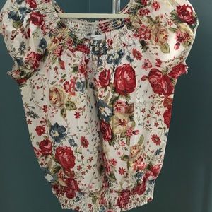 Sleeveless, banded at the waist, cotton blouse